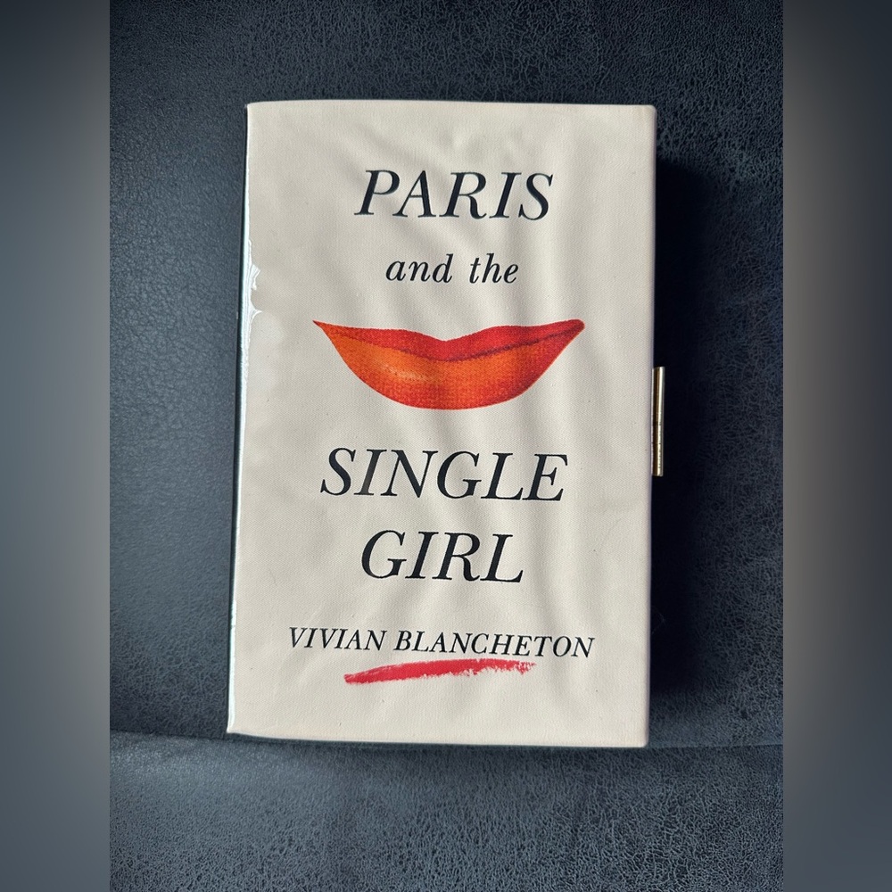Kate spade paris and the single girl book clutch